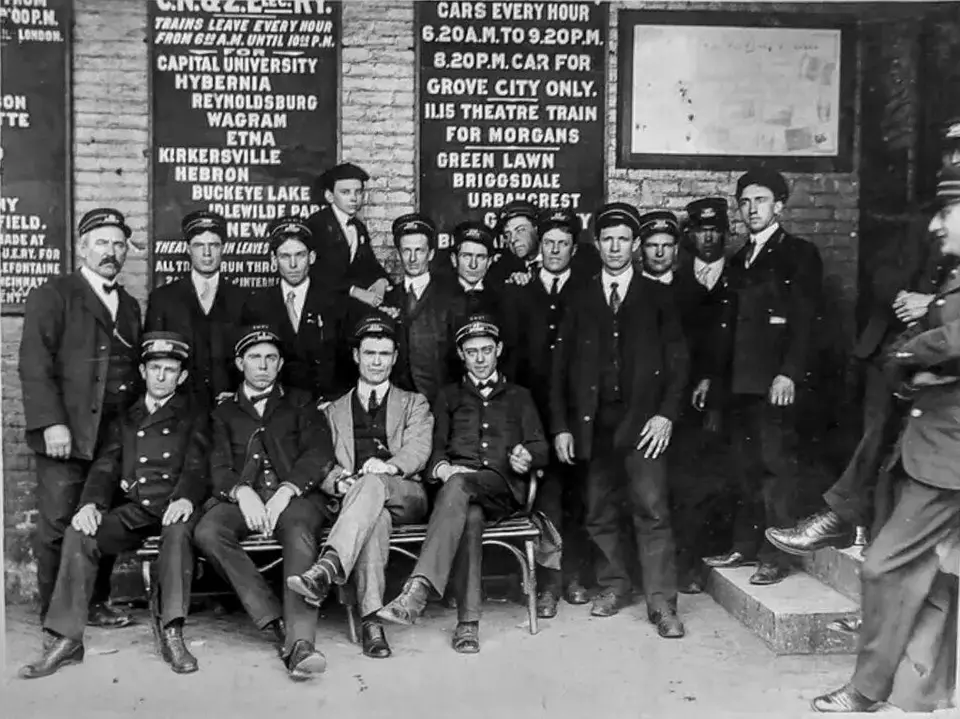 Trolley workers at the car barn, 1910 (archival photograph)